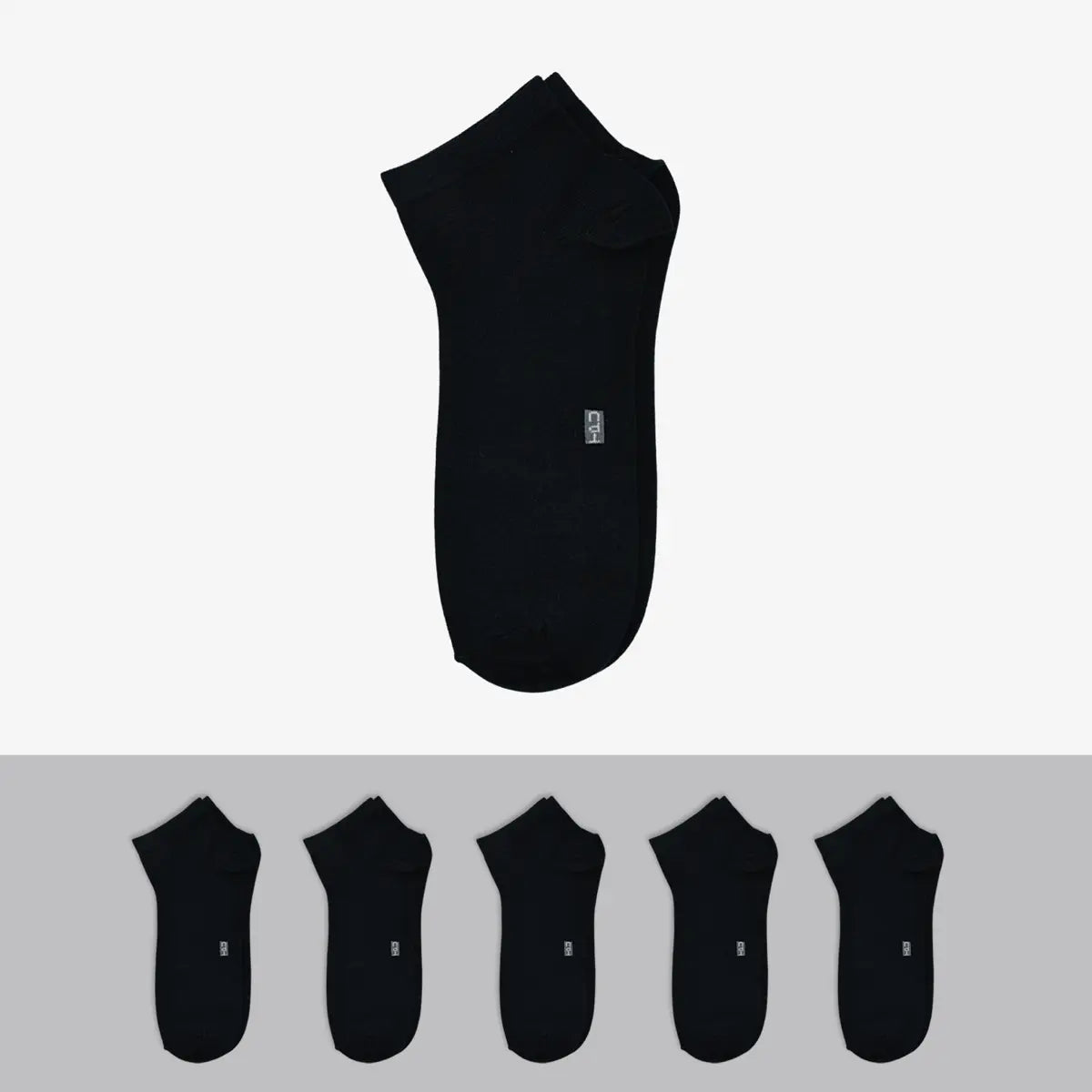 The Perfect Underwear bamboo low cut socks in black, showing one single sock above a row of five matching socks.