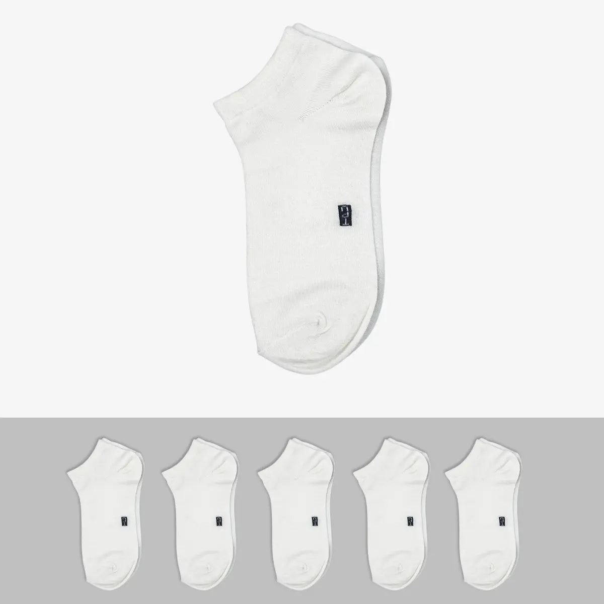 The Perfect Underwear bamboo low cut socks in white, showing one sock above a row of five matching socks.