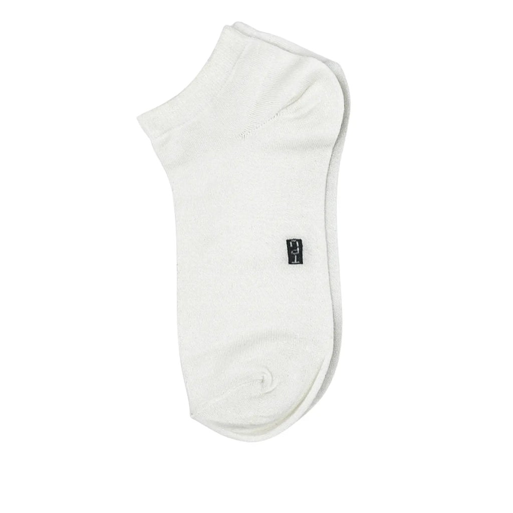 The Perfect Underwear bamboo socks in white, showing a single sock from the side with a small woven brand logo.